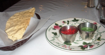 Papadum (lentil flatbread) is served with every meal