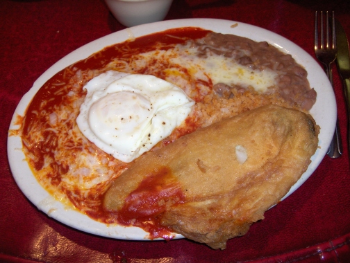 Red enchiladas served flat New Mexico style