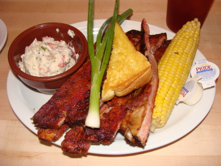 Ribs, potato salad, and corn