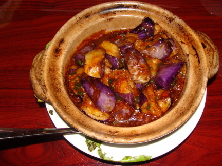 Chinese eggplant in clay pot